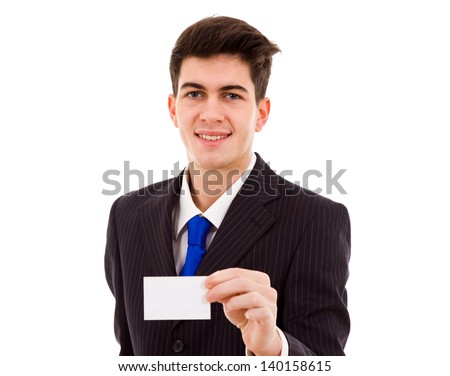 Young businessman with business card on white background