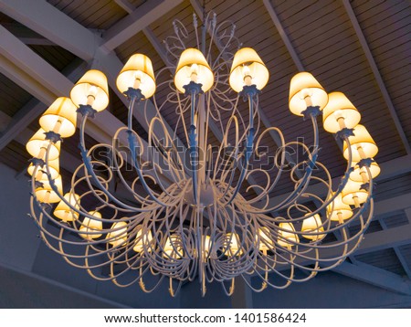 metal structure lamp with several light bulbs