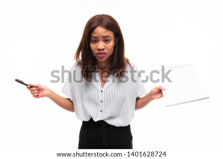 charming dark-skinned young girl explain smth on the plane table isolated on background
