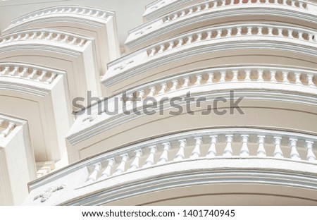 Pattern of Architecture geometric, architectural details of classic vintage white balustrade balcony building.
