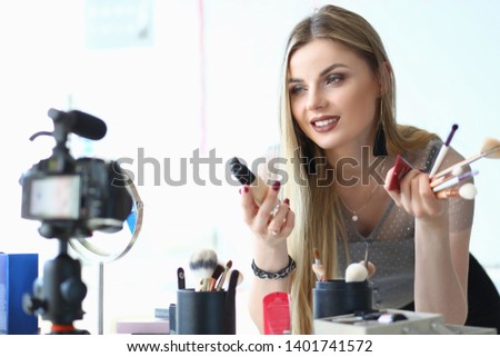 Female Blogger Recording Video for Beauty Blog. Beautiful Woman Recommend Cosmetics Filming Process on Camcorder. Caucasian Vlogger Girl Holding at Concealer. Streaming Online Translation Concept