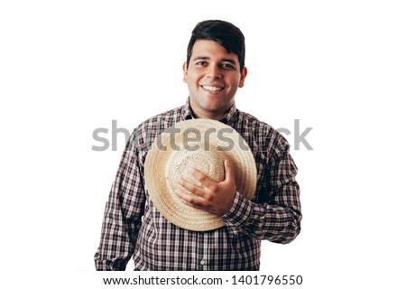 Brazilian man wearing traditional clothes for Festa Junina - June festival - isolated on white background