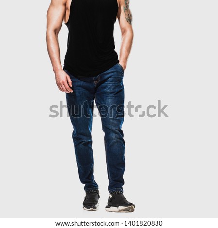 legs of handsome smiling young muscular man