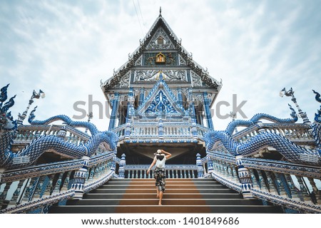 Asian traveller woman travel in Wat Pak Nam Khaem Nu temple, Chanthaburi, Thailand Royalty-Free Stock Photo #1401849686