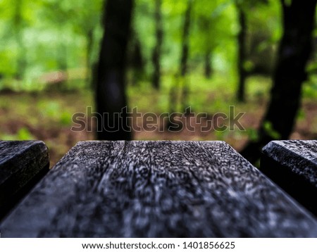 wooden board on a colorful blurry background