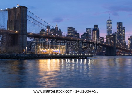 Brooklyn Bridge at night view from Brooklyn neighborhood, Manhattan, New York.
