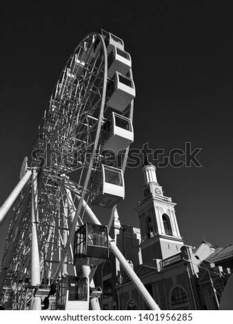 Kiev, Ferris wheel on Pochtovaya Square panorama of the city, black and white infrared photo