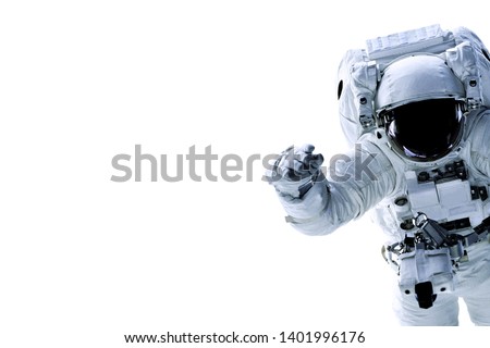 Single space Astronaut with black glas on the helmet isolated on white background with free space in the left part of image. Elements of this image were furnished by NASA Royalty-Free Stock Photo #1401996176
