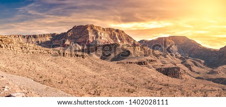 Inhospitable Arizona Desert with Beautiful Sky at Sunset Royalty-Free Stock Photo #1402028111