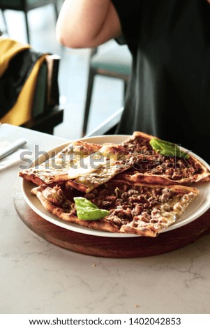 Traditional turkish baked dish pide. Turkish pizza pide, Middle eastern appetizers. Turkish cuisine. Pide with meat filling
