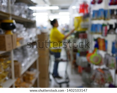 abstract blurred of woman shopping on the supermarket. 
