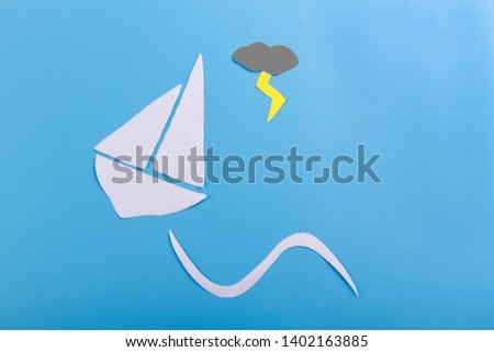 paper art of a ship on a wave