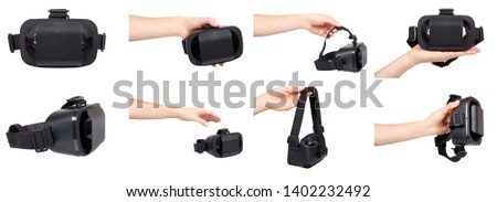Hand with black plastic virtual reality mask, vr glasses, set and collection. Isolated on white background