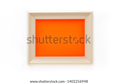 White retro old picture frame with blank orange space inside, on white background.