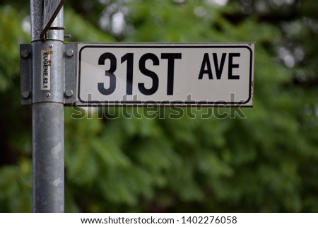 Thirty first/31st Avenue road sign/street name