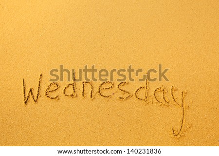 Wednesday - written in sand texture.