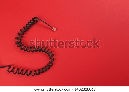 Curl black wire on red background - Image 