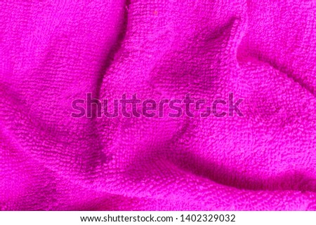 pink towel texture and background.