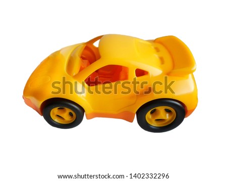 Toy yellow machine isolated on white background
