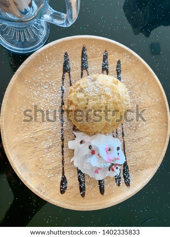 Delicious dessert fried ice cream on a table from top view