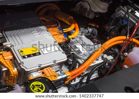 Detail of engine of car. (electric car) Royalty-Free Stock Photo #1402337747