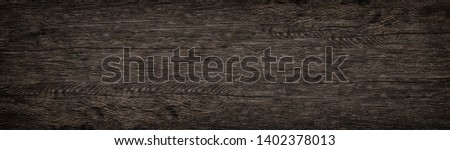 Wooden solid surface wide texture. Dark brown wood panoramic background