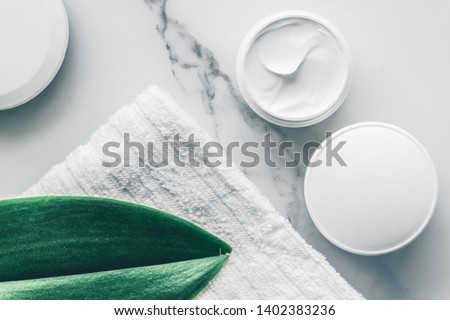 Skincare and body care, luxury spa and clean products concept - organic beauty cosmetics on marble, home spa flatlay background Royalty-Free Stock Photo #1402383236