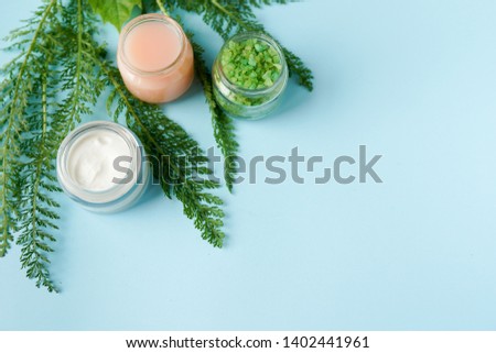 image of cosmetics ingredients on blue background with copy space. skincare theme . natural organic products