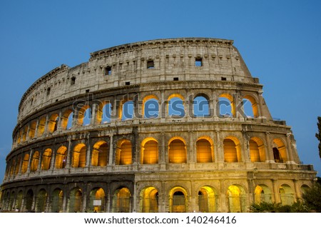 Night scene of Colosseum in Rome, one of the seven wonders of the world. Royalty-Free Stock Photo #140246416