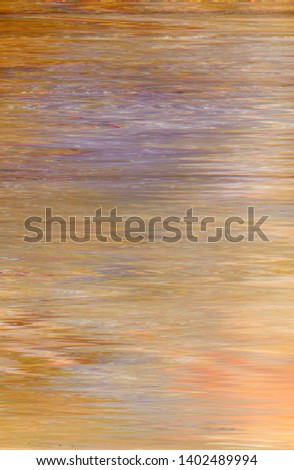 Abstract art texture background. Seaside sunset. Water surface in motion design. Beautiful orange paint with ripple effect.