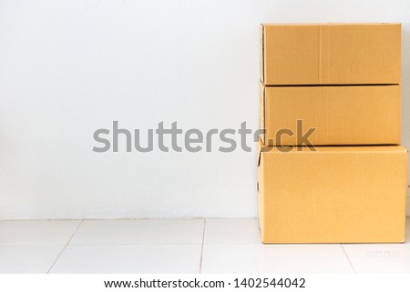Box package parcel for post delivery placed on an area with a white background,Carton box crate