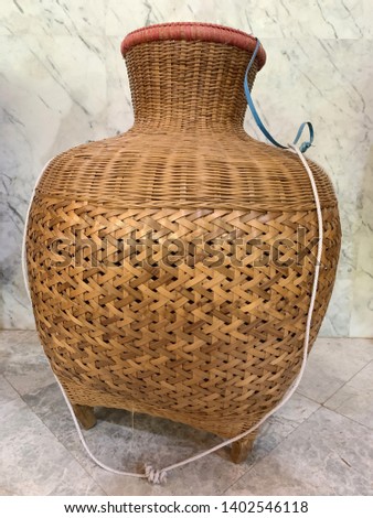 Old style of bamboo basket to keep rice or things Royalty-Free Stock Photo #1402546118