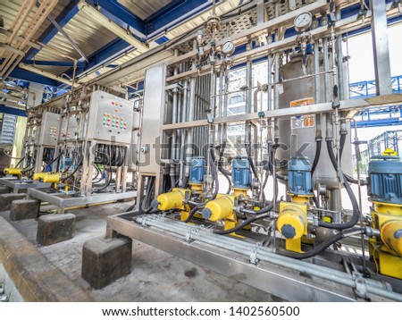 Chemical dosing for feed to HRSG boiler for keep quality of steam in drum before admit steam to steam turbine generator systems in Combined-Cycle Co-Generation Power Plant. Royalty-Free Stock Photo #1402560500