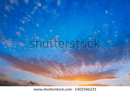 beautiful sky at sunset, blue and pink clouds at sunrise
