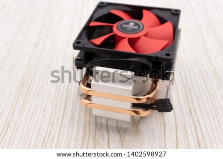 Powerful computer cooler with red fun turning twirl