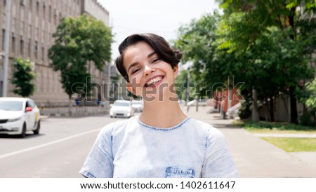 Portrait of beauty woman walking on the street 