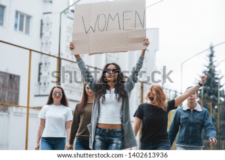 Somebody has to make move. Group of feminist women have protest for their rights outdoors.