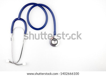 Blue stethoscope with shadow isolated on white background - Image