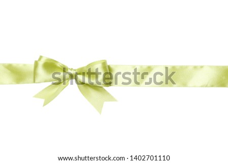 light green bow and ribbon isolated on white background. The concept of gifts.