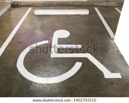 The sign indicates that the parking is disabled.