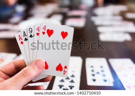 Table of playing cards, open hand of cards
