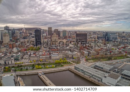 Aerial View of the Montreal Skyline and Harbor on a cloudy Day in May