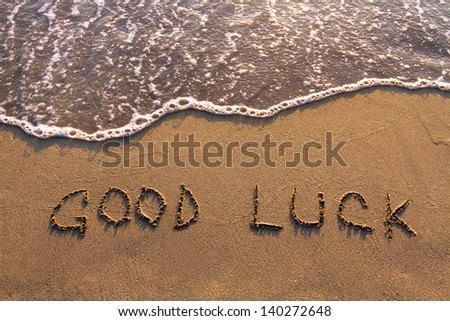 good luck, words written on the beach Royalty-Free Stock Photo #140272648