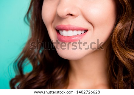 Cropped close-up view portrait of her she nice shine adorable perfect healthy white cheerful cheery wavy-haired girl every day hygiene isolated over bright vivid shine blue background