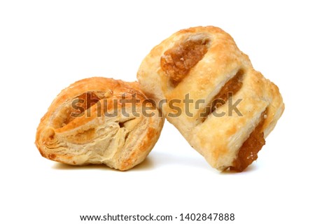 Sweet braided puff pastry isolated or pate feuilletee on white background top view. Fresh phyllo pastry with jam inside close up - Image 