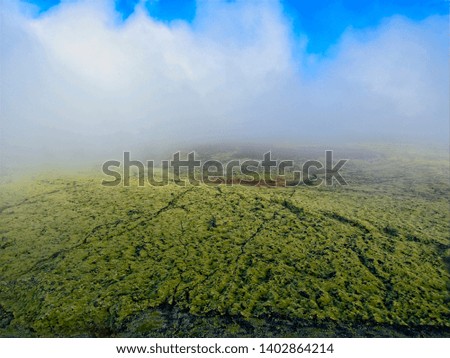 Bláfjallavegur (blafjallavegur) in Iceland. Drone image taken close to the road called Blafjallavegur. Green moss on a lava field. 