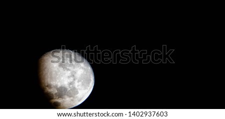 Moon closeup in the night sky. Planet moon close-up