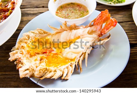 Grilled fresh big shrimp ( Macrobrachium rosenbergii) at Thailand seafood restaurant. Royalty-Free Stock Photo #140295943