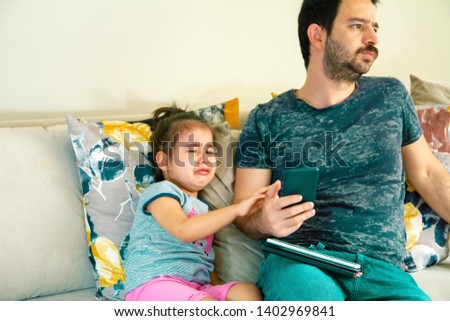little girl crying to get phone