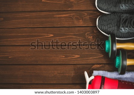 New life, sports paraphernalia on a wooden background, flat concept position.